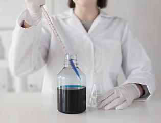 Image showing close up of scientist making test in lab