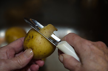 Image showing Potato peeling