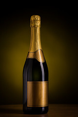 Image showing bottle of champagne with blank golden label