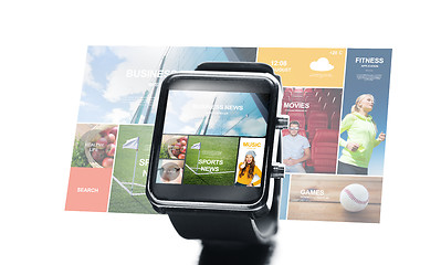 Image showing close up of smart watch with media projection