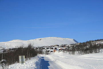 Image showing Mountain cabins in winter