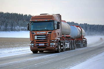 Image showing Bronze Scania Tank Truck on Winter Road