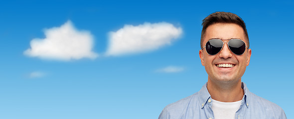 Image showing face of smiling man in shirt and sunglasses