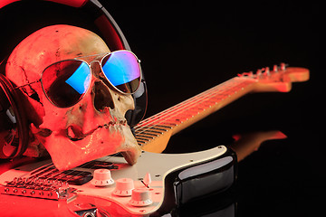 Image showing Still life with skull and electric guitar