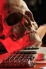 Image showing Still life with skull and electric guitar
