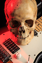 Image showing Still life with skull and electric guitar