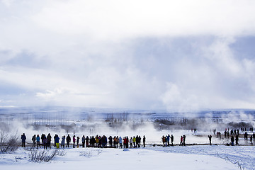 Image showing Tourists at the famous geyser Strokkur, Iceland