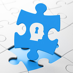 Image showing Advertising concept: Head With Keyhole on puzzle background