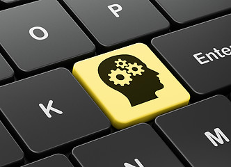 Image showing Finance concept: Head With Gears on computer keyboard background