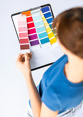 Image showing woman working with color samples for selection