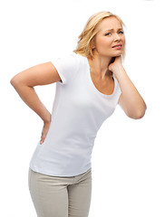 Image showing unhappy woman suffering from backache