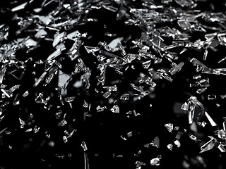 Image showing Pieces of shattered or cracked glass with shallow dof