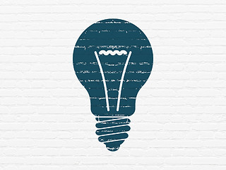 Image showing Finance concept: Light Bulb on wall background