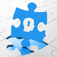 Image showing Business concept: Head With Keyhole on puzzle background