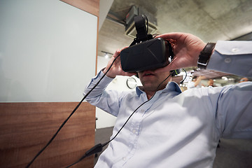 Image showing man using virtual reality gadget computer glasses