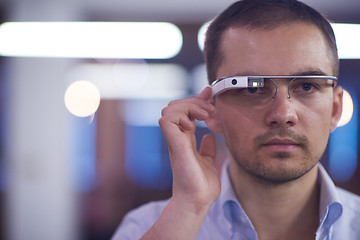 Image showing man using virtual reality gadget computer glasses