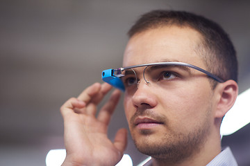 Image showing man using virtual reality gadget computer glasses