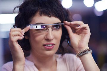 Image showing woman using virtual reality gadget computer glasses