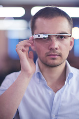 Image showing man using virtual reality gadget computer glasses