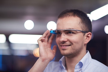 Image showing man using virtual reality gadget computer glasses