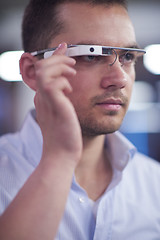 Image showing man using virtual reality gadget computer glasses