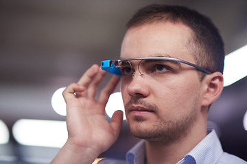 Image showing man using virtual reality gadget computer glasses