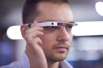 Image showing man using virtual reality gadget computer glasses