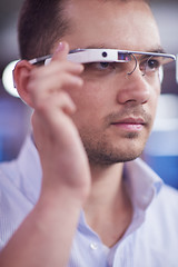 Image showing man using virtual reality gadget computer glasses