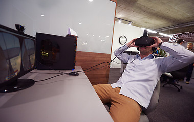 Image showing man using virtual reality gadget computer glasses