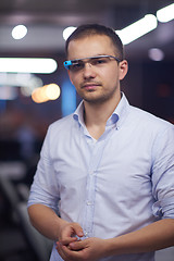 Image showing man using virtual reality gadget computer glasses