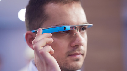 Image showing man using virtual reality gadget computer glasses