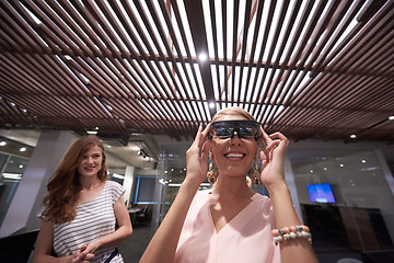 Image showing woman using virtual reality gadget computer glasses