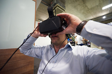 Image showing man using virtual reality gadget computer glasses