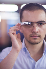 Image showing man using virtual reality gadget computer glasses