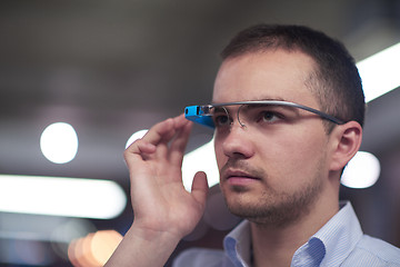 Image showing man using virtual reality gadget computer glasses