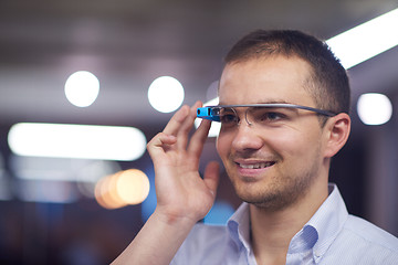 Image showing man using virtual reality gadget computer glasses