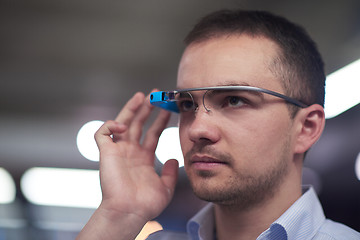 Image showing man using virtual reality gadget computer glasses