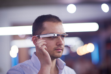 Image showing man using virtual reality gadget computer glasses