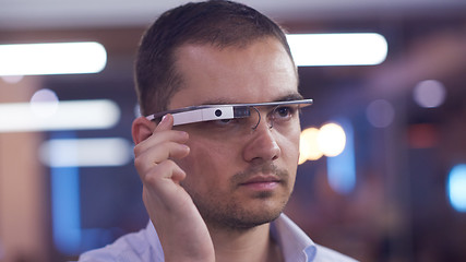 Image showing man using virtual reality gadget computer glasses