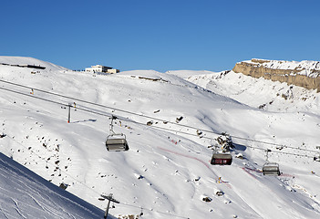 Image showing Ski slope and chair-lift at sun day