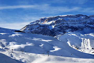 Image showing Ski resort and sunlight rocks at sunset