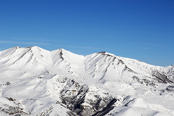 Image showing Snowy winter mountains at nice sun day