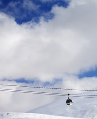 Image showing Gondola lift and off-piste slope at sun day