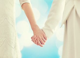 Image showing close up of happy married lesbian couple hugging