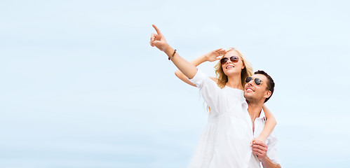 Image showing couple in shades at sea side