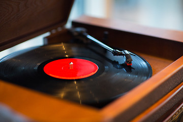 Image showing close up of vintage record player with vinyl disc