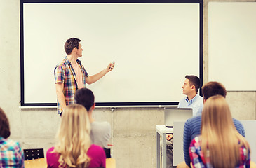 Image showing group of students and teacher in classroom