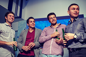 Image showing group of male friends with beer in nightclub