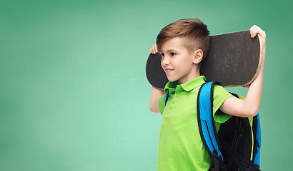 Image showing happy student boy with backpack and skateboard