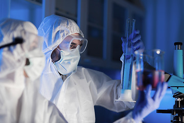 Image showing close up of scientists making test in lab